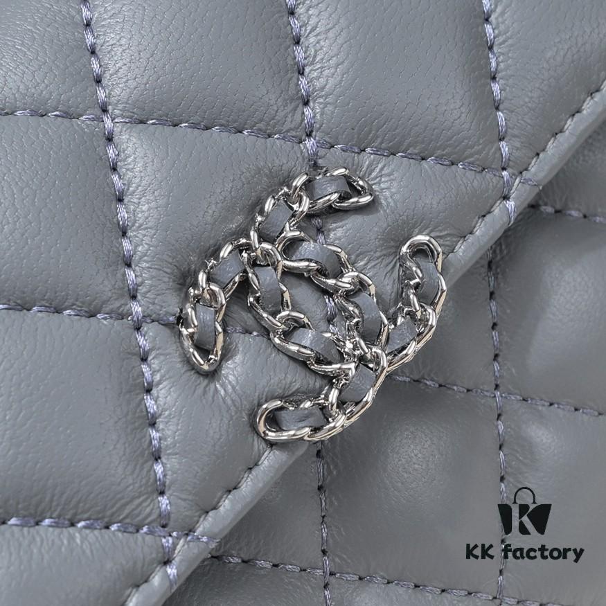 Small Chanel Kelly Bag in Black Lamb Leather with Long Handle