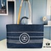 Large New Arrival CHANEL Navy Striped Denim Beach Tote – The Perfect Companion for Vacation and Everyday Elegance