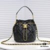 Chanel Vintage Drawstring Button Bag Made of Lambskin with Classic Quilting and Chain-in-Leather Strap