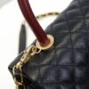 Black and Red Chanel-Style Shoulder Handbag with Unique Clasp Design, Dual Carry Options (Handheld or Crossbody), Premium Imported Full-Grain Calfskin with Lychee Texture, Upgraded Gold-Tone Hardware