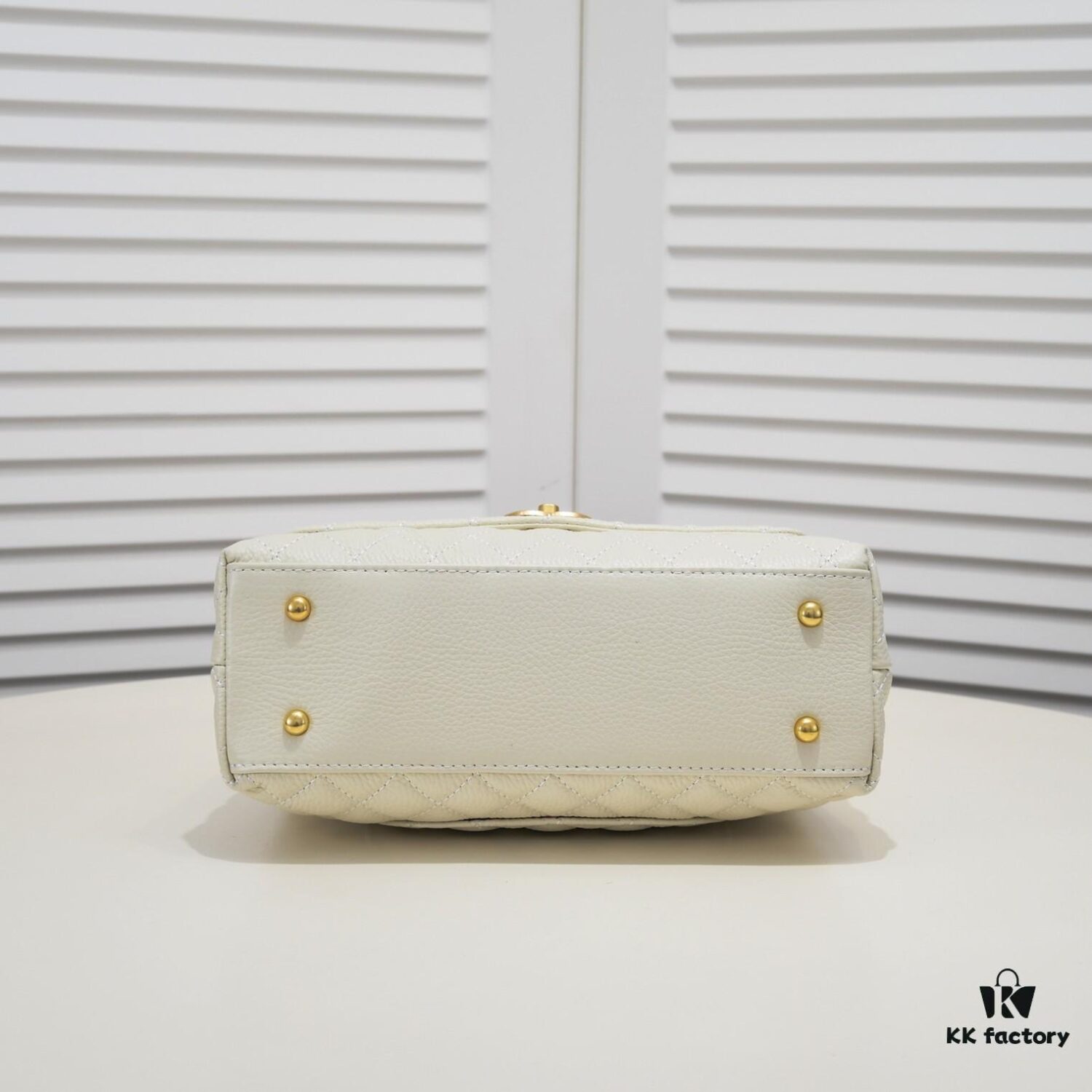 Medium White Chanel Flap Bag with Unique Design, Dual Carry Tote or Shoulder Style, Exquisite Craftsmanship