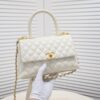 Medium White Chanel Flap Bag with Unique Design, Dual Carry Tote or Shoulder Style, Exquisite Craftsmanship
