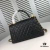 Medium Black Chanel Flap Bag with Unique Design, Dual Carry Tote and Shoulder Style
