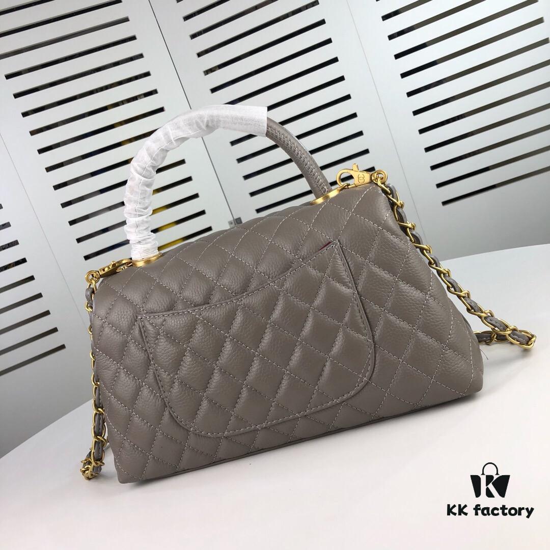 Medium Gray Chanel Flap Bag with Unique Design, Dual Shoulder and Top Handle Carry, Made from Imported Full-Grain Calfskin with Lychee Texture, Premium Gold-Tone Hardware