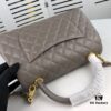Medium Gray Chanel Flap Bag with Unique Design, Dual Shoulder and Top Handle Carry, Made from Imported Full-Grain Calfskin with Lychee Texture, Premium Gold-Tone Hardware