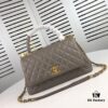 Medium Gray Chanel Flap Bag with Unique Design, Dual Shoulder and Top Handle Carry, Made from Imported Full-Grain Calfskin with Lychee Texture, Premium Gold-Tone Hardware
