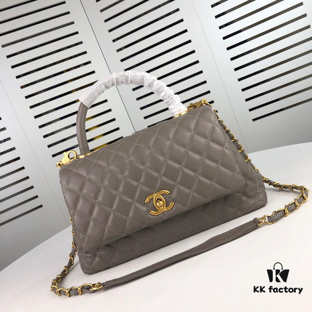 Medium Gray Chanel Flap Bag with Unique Design, Dual Shoulder and Top Handle Carry, Made from Imported Full-Grain Calfskin with Lychee Texture, Premium Gold-Tone Hardware