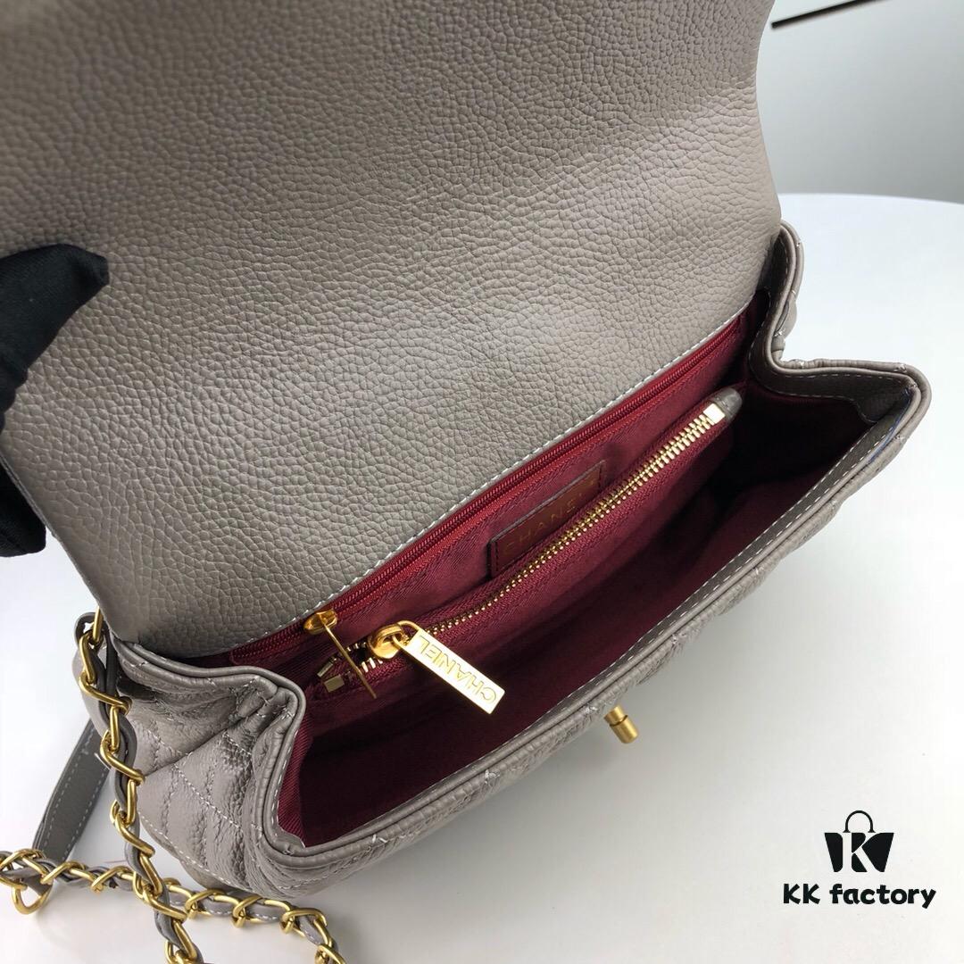 Medium Gray Chanel Flap Bag with Unique Design, Dual Shoulder and Top Handle Carry, Made from Imported Full-Grain Calfskin with Lychee Texture, Premium Gold-Tone Hardware