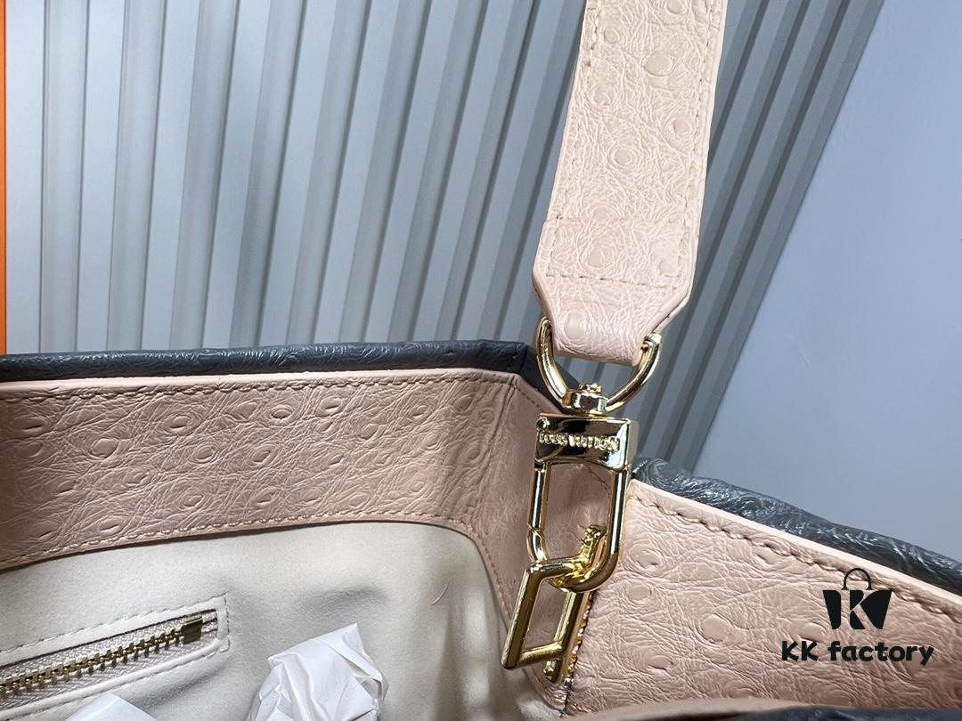 M24457 M24475 This Medium Shopper Handbag Draws Inspiration from Louis Vuitton's Shopping Tote