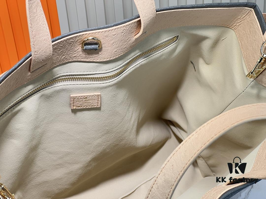 M24457 M24475 This Medium Shopper Handbag Draws Inspiration from Louis Vuitton's Shopping Tote