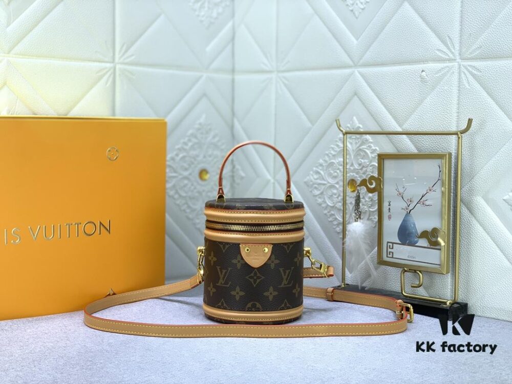 Upgraded Original Version [Exclusive Real Photo M82952 Monogram. Yellow Flower] This Nano Cannes Handbag features a cylindrical silhouette crafted from Monogram canvas, echoing the design of a makeup pouch.