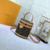 Upgraded Original Version [Exclusive Real Photo M82952 Monogram. Yellow Flower] This Nano Cannes Handbag features a cylindrical silhouette crafted from Monogram canvas, echoing the design of a makeup pouch.