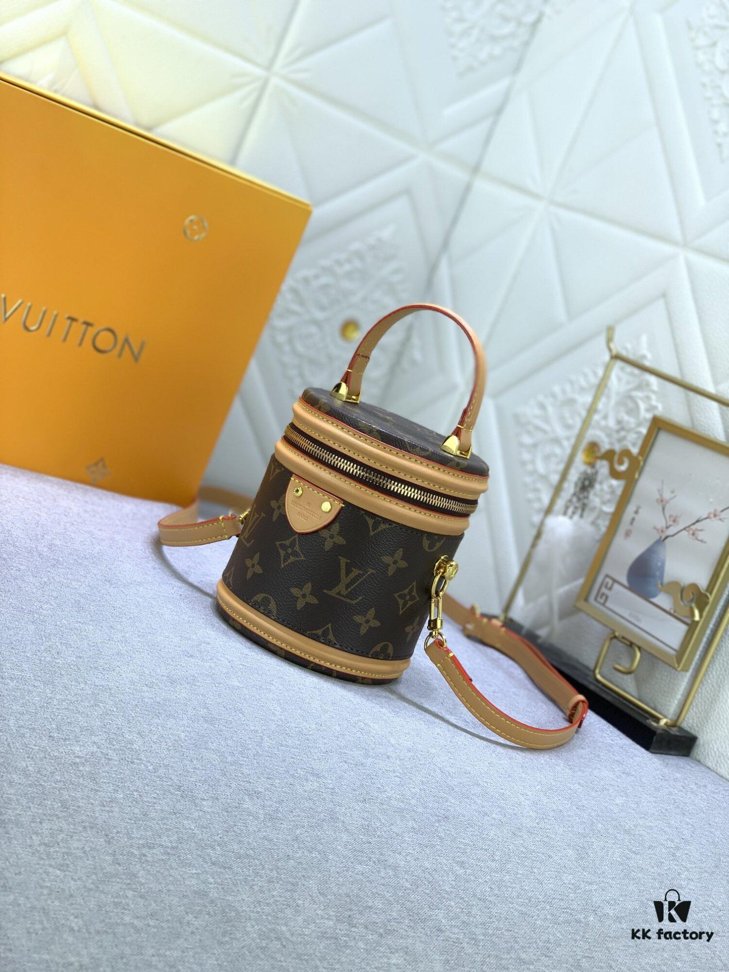 Upgraded Original Version [Exclusive Real Photo M82952 Monogram. Yellow Flower] This Nano Cannes Handbag features a cylindrical silhouette crafted from Monogram canvas, echoing the design of a makeup pouch.