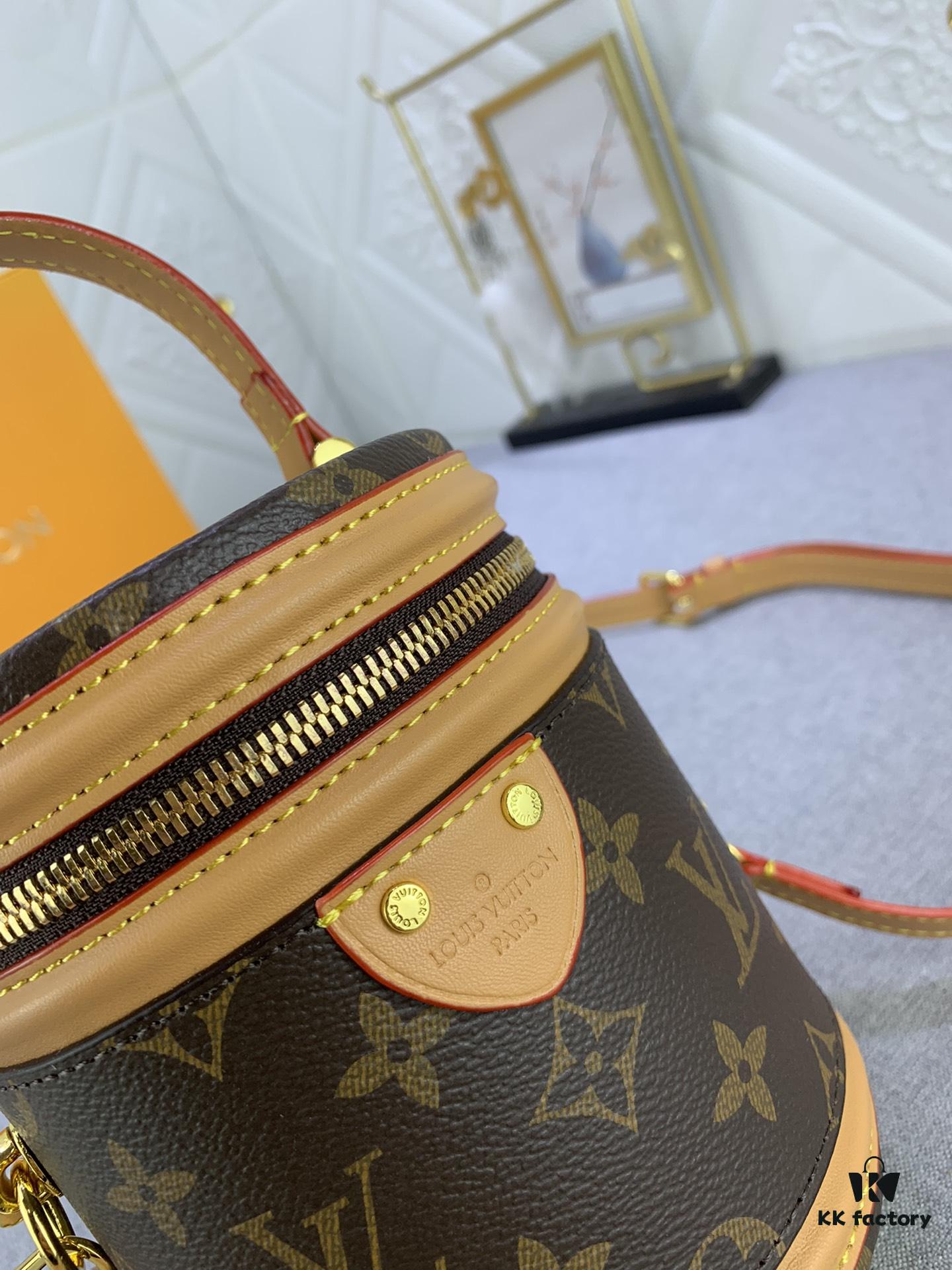 Upgraded Original Version [Exclusive Real Photo M82952 Monogram. Yellow Flower] This Nano Cannes Handbag features a cylindrical silhouette crafted from Monogram canvas, echoing the design of a makeup pouch.