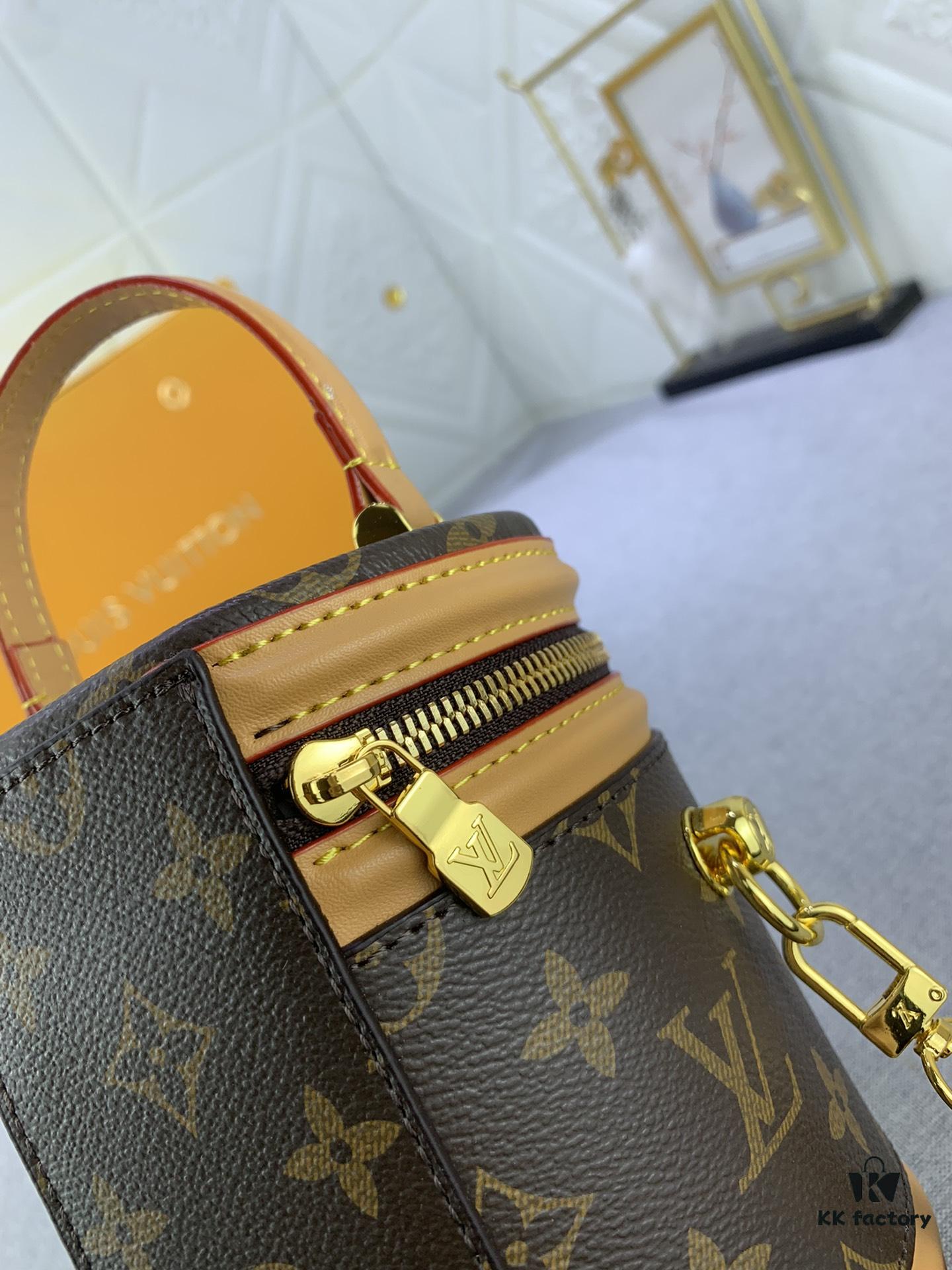 Upgraded Original Version [Exclusive Real Photo M82952 Monogram. Yellow Flower] This Nano Cannes Handbag features a cylindrical silhouette crafted from Monogram canvas, echoing the design of a makeup pouch.