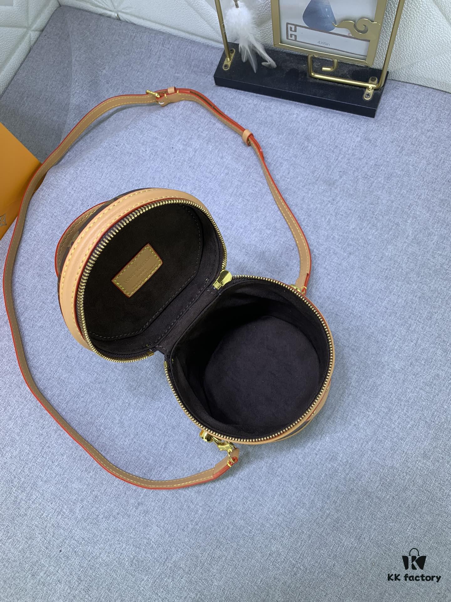 Upgraded Original Version [Exclusive Real Photo M82952 Monogram. Yellow Flower] This Nano Cannes Handbag features a cylindrical silhouette crafted from Monogram canvas, echoing the design of a makeup pouch.