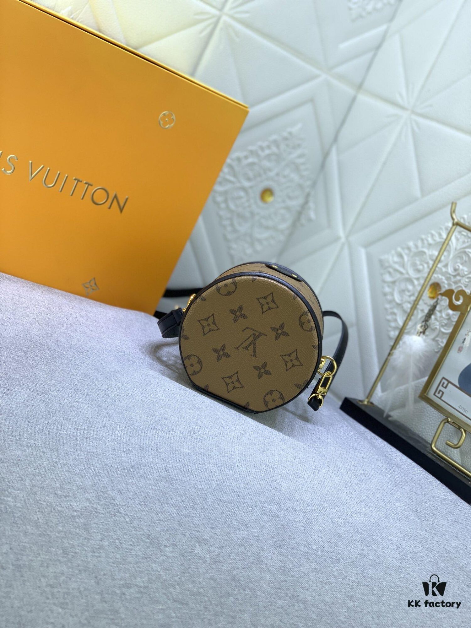 Upgraded Original Version [Exclusive Real Photo M82952 Monogram. Yellow Flower] This Nano Cannes Handbag features a cylindrical silhouette cut from Monogram canvas, echoing the design of a makeup pouch.