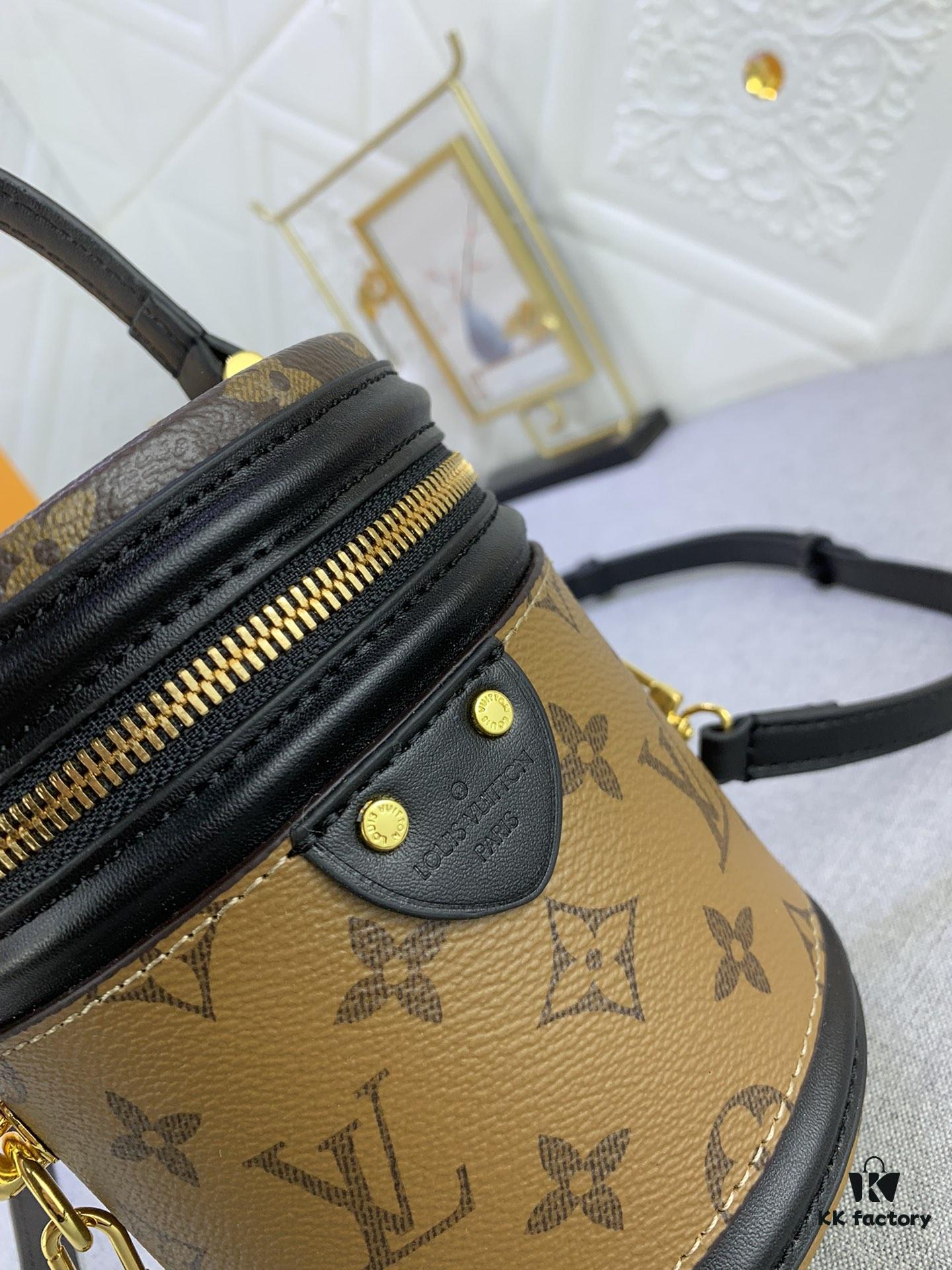 Upgraded Original Version [Exclusive Real Photo M82952 Monogram. Yellow Flower] This Nano Cannes Handbag features a cylindrical silhouette cut from Monogram canvas, echoing the design of a makeup pouch.