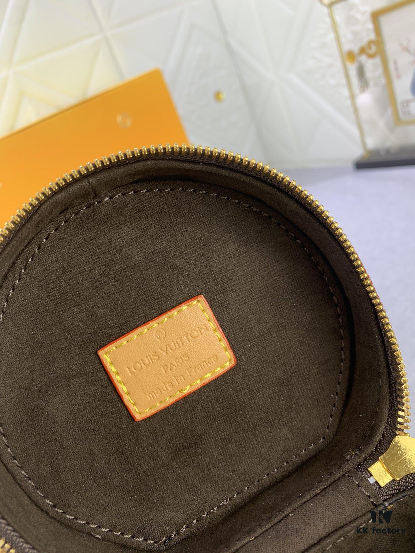 Upgraded Original Version [Exclusive Real Photo M82952 Monogram. Yellow Flower] This Nano Cannes Handbag features a cylindrical silhouette crafted from Monogram canvas, echoing the design of a makeup pouch.