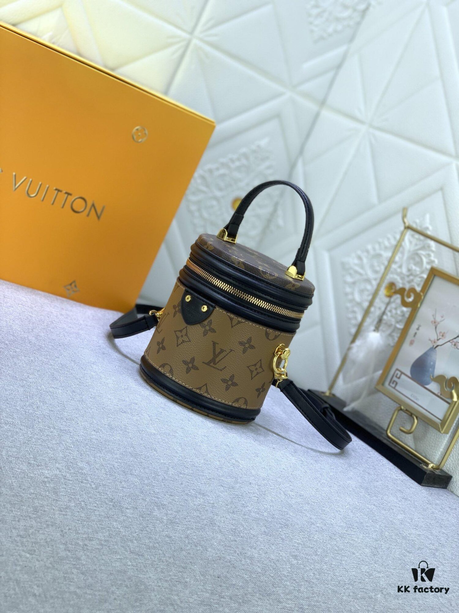 Upgraded Original Version [Exclusive Real Photo M82952 Monogram. Yellow Flower] This Nano Cannes Handbag features a cylindrical silhouette cut from Monogram canvas, echoing the design of a makeup pouch.