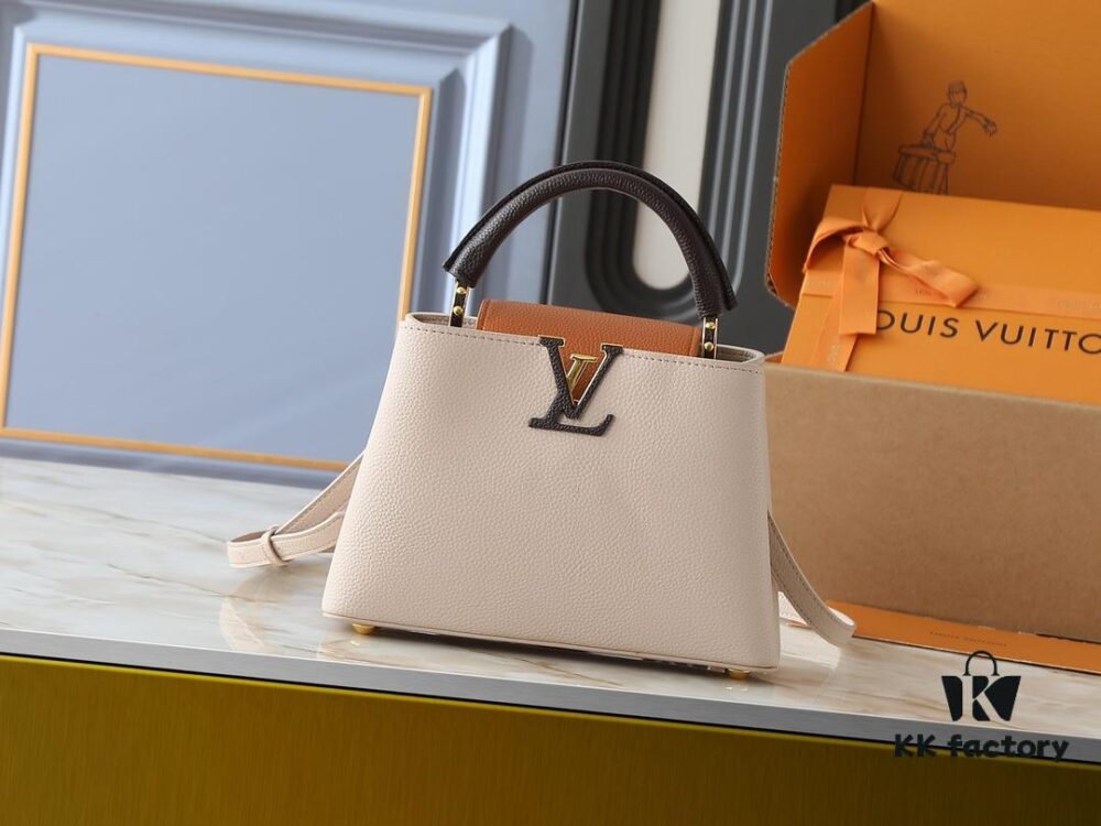 Guangzhou Goods Upgrade Original Version M12956 M12952 M14176 This Mini Capucines Bag Features Luxurious Taurillon Cowhide Leather in a Refined Seasonal Hue, Accentuated with Shining Metal Hardware and the LV Initials as a Signature Detail. The Flap Can Be Worn Externally or Tucked Inside to Reveal a Well-Organized Interior, While the Zippered Pocket Offers Secure Storage for Valuables. The Detachable and Adjustable Shoulder Strap Allows for Versatile Carrying Options. Dimensions: 27.0 x 17.3 x 9.0 cm (L x H x W)