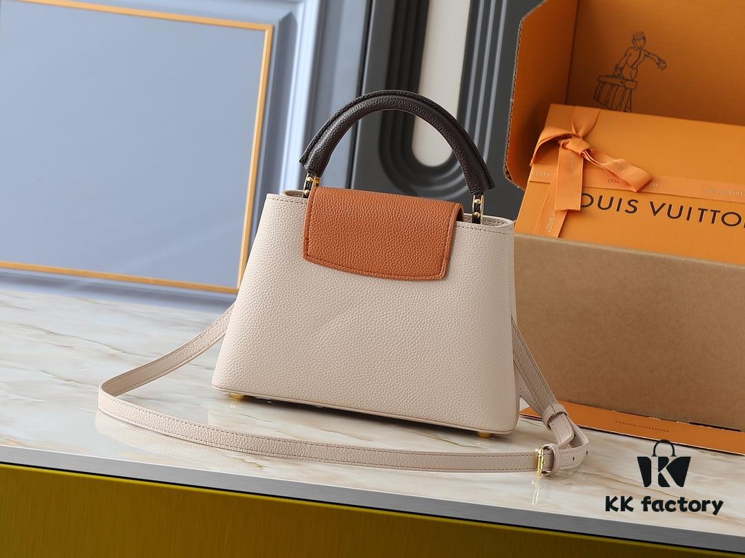 Guangzhou Goods Upgrade Original Version M12956 M12952 M14176 This Mini Capucines Bag Features Luxurious Taurillon Cowhide Leather in a Refined Seasonal Hue, Accentuated with Shining Metal Hardware and the LV Initials as a Signature Detail. The Flap Can Be Worn Externally or Tucked Inside to Reveal a Well-Organized Interior, While the Zippered Pocket Offers Secure Storage for Valuables. The Detachable and Adjustable Shoulder Strap Allows for Versatile Carrying Options. Dimensions: 27.0 x 17.3 x 9.0 cm (L x H x W)