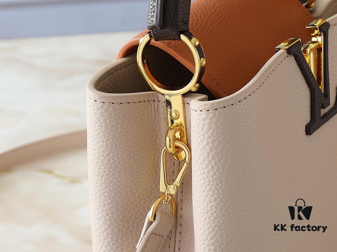 Guangzhou Goods Upgrade Original Version M12956 M12952 M14176 This Mini Capucines Bag Features Luxurious Taurillon Cowhide Leather in a Refined Seasonal Hue, Accentuated with Shining Metal Hardware and the LV Initials as a Signature Detail. The Flap Can Be Worn Externally or Tucked Inside to Reveal a Well-Organized Interior, While the Zippered Pocket Offers Secure Storage for Valuables. The Detachable and Adjustable Shoulder Strap Allows for Versatile Carrying Options. Dimensions: 27.0 x 17.3 x 9.0 cm (L x H x W)