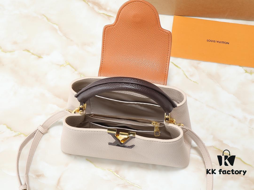 Guangzhou Goods Upgrade Original Version M12956 M12952 M14176 This Mini Capucines Bag Features Luxurious Taurillon Cowhide Leather in a Refined Seasonal Hue, Accentuated with Shining Metal Hardware and the LV Initials as a Signature Detail. The Flap Can Be Worn Externally or Tucked Inside to Reveal a Well-Organized Interior, While the Zippered Pocket Offers Secure Storage for Valuables. The Detachable and Adjustable Shoulder Strap Allows for Versatile Carrying Options. Dimensions: 27.0 x 17.3 x 9.0 cm (L x H x W)