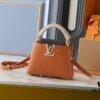 Guangzhou Goods Upgraded Original Version M12956 M12952 M14176 This Mini Capucines Handbag in Elegant Taurillon Calfskin with Shiny Metal Hardware and LV Letter Accent