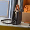 Guangzhou Goods Upgraded Original Version M12956 M12952 M14176 This Mini Capucines Bag Features Elegant Taurillon Calfskin with Seasonal Hues and Shiny Metal LV Lettering