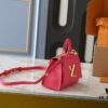 Upgraded Original M21590 M59090 Twist One Handle BB Handbag crafted from deeply dyed Taurillon leather, featuring a top single handle and the iconic LV Twist turn-lock flap closure. The contrast-color leather lining adds a fashionable touch, suitable for crossbody, shoulder, or handheld wear.