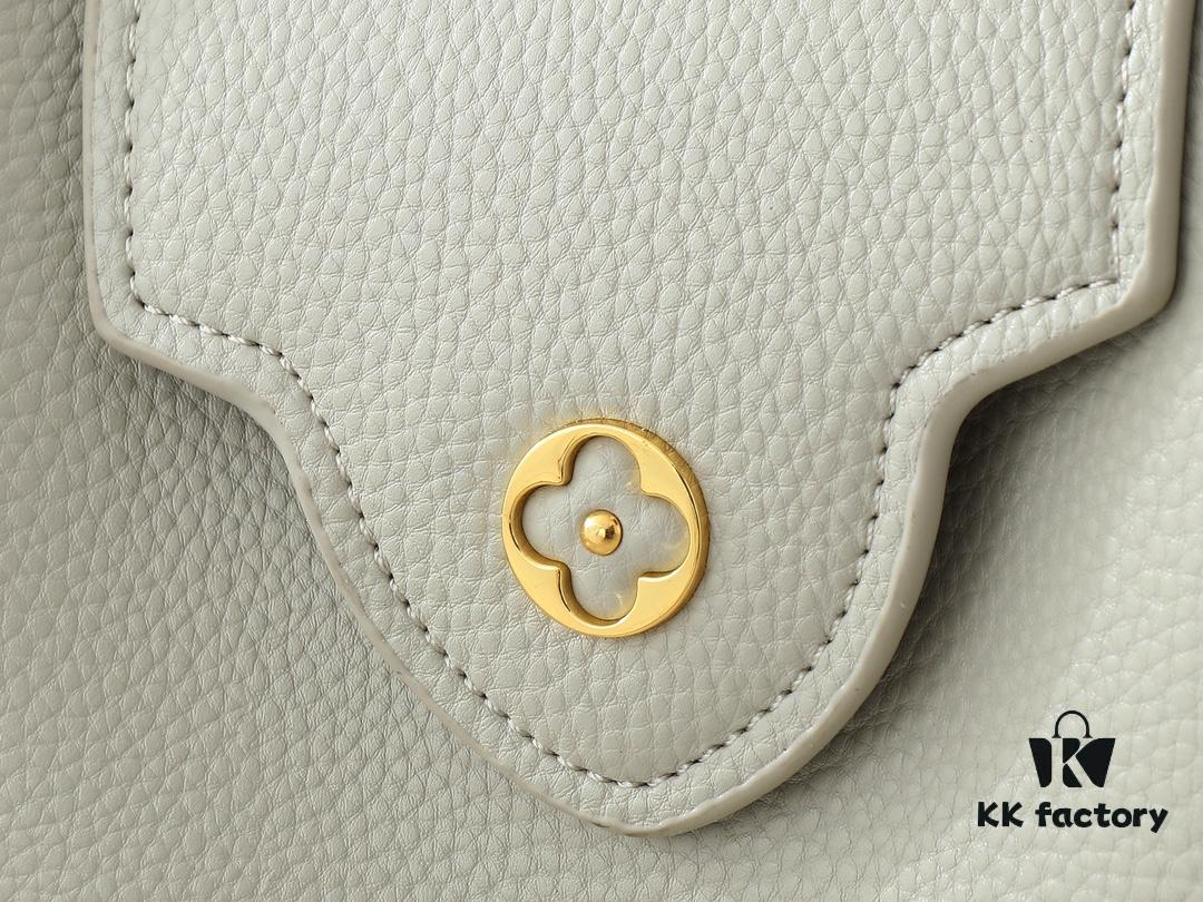 Upgraded Original M24728 M24736 M25087 M24655 M24656 M24733 M24729 M25090 M12785 M24727 M24745 This Mini Capucines Bag is crafted from refined Taurillon leather, accented with glossy handle rings and the signature LV initials to highlight its compact silhouette. The detachable shoulder strap allows versatile styling as a shoulder or crossbody bag. Dimensions: 21.0 x 13.6 x 8.0 cm (Length x Height x Width)