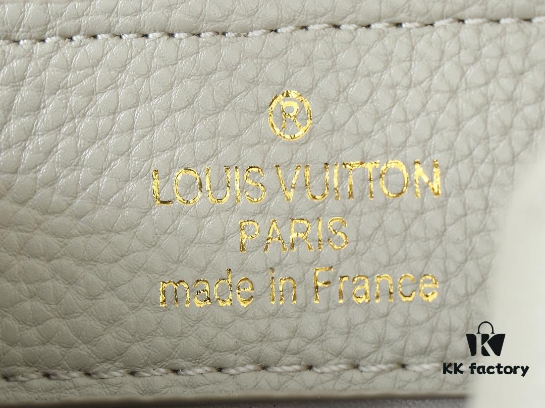 Upgraded Original M24728 M24736 M25087 M24655 M24656 M24733 M24729 M25090 M12785 M24727 M24745 This Mini Capucines Bag is crafted from refined Taurillon leather, accented with glossy handle rings and the signature LV initials to highlight its compact silhouette. The detachable shoulder strap allows versatile styling as a shoulder or crossbody bag. Dimensions: 21.0 x 13.6 x 8.0 cm (Length x Height x Width)