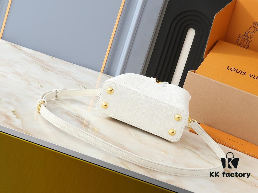 Upgraded Original M24728 M24736 M25087 M24655 M24656 M24733 M24729 M25090 M12785 M24727 M24745 This Capucines Mini Bag is crafted from refined Taurillon cowhide leather, accentuated by a lustrous handle ring and the iconic LV initials, enhancing its compact silhouette. Featuring a detachable shoulder strap for versatile styling as a shoulder or crossbody bag. Dimensions: 21.0 x 13.6 x 8.0 cm (L x H x W)