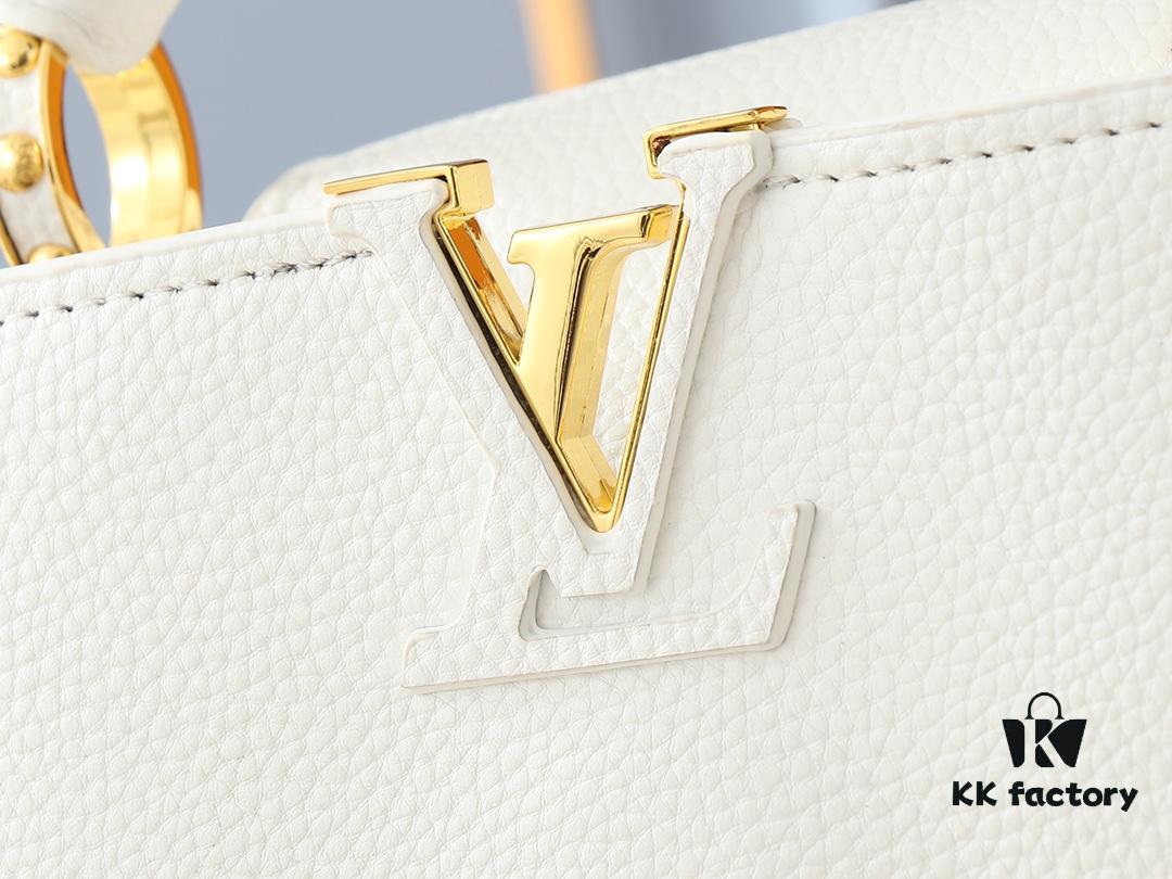 Upgraded Original M24728 M24736 M25087 M24655 M24656 M24733 M24729 M25090 M12785 M24727 M24745 This Capucines Mini Bag is crafted from refined Taurillon cowhide leather, accentuated by a lustrous handle ring and the iconic LV initials, enhancing its compact silhouette. Featuring a detachable shoulder strap for versatile styling as a shoulder or crossbody bag. Dimensions: 21.0 x 13.6 x 8.0 cm (L x H x W)