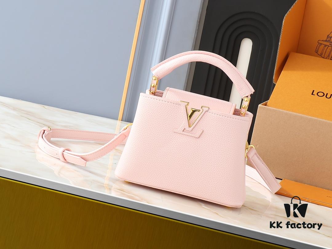 Upgraded Original M24728 M24736 M25087 M24655 M24656 M24733 M24729 M25090 M12785 M24727 M24745 This Mini Capucines Bag is crafted from refined Taurillon leather, accentuated by lustrous handle rings and the signature LV lettering that enhances its compact silhouette. The detachable shoulder strap allows for versatile styling as a shoulder or cross-body bag. Dimensions: 21.0 x 13.6 x 8.0 cm (L x H x W)