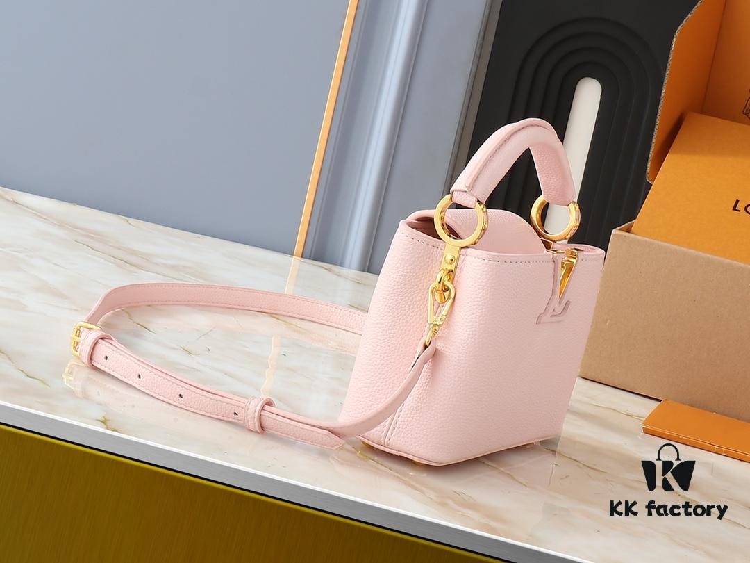 Upgraded Original M24728 M24736 M25087 M24655 M24656 M24733 M24729 M25090 M12785 M24727 M24745 This Mini Capucines Bag is crafted from refined Taurillon leather, accentuated by lustrous handle rings and the signature LV lettering that enhances its compact silhouette. The detachable shoulder strap allows for versatile styling as a shoulder or cross-body bag. Dimensions: 21.0 x 13.6 x 8.0 cm (L x H x W)