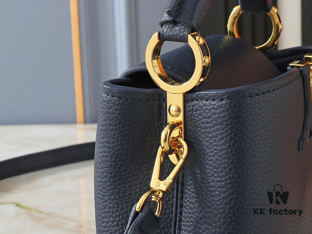 Upgraded Original M24728 M24736 M25087 M24655 M24656 M24733 M24729 M25090 M12785 M24727 M24745 This Mini Capucines Bag is crafted from refined Taurillon leather, accentuated by a lustrous handle ring and the iconic LV letter motif that enhances its compact silhouette. Featuring a detachable shoulder strap for versatile styling as a shoulder or crossbody bag. Dimensions: 21.0 x 13.6 x 8.0 cm (Length x Height x Width)