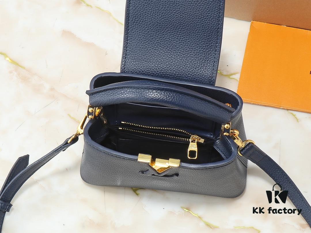 Upgraded Original M24728 M24736 M25087 M24655 M24656 M24733 M24729 M25090 M12785 M24727 M24745 This Mini Capucines Bag is crafted from refined Taurillon leather, accentuated by a lustrous handle ring and the iconic LV letter motif that enhances its compact silhouette. Featuring a detachable shoulder strap for versatile styling as a shoulder or crossbody bag. Dimensions: 21.0 x 13.6 x 8.0 cm (Length x Height x Width)