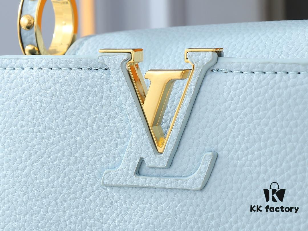 Upgraded Original M24728 M24736 M25087 M24655 M24656 M24733 M24729 M25090 M12785 M24727 M24745 This Capucines Mini Bag is crafted from refined Taurillon calf leather, accented with a lustrous handle ring and the iconic LV letter motif that enhances its compact silhouette. Featuring a detachable shoulder strap for versatile styling as a shoulder or crossbody bag. Dimensions: 21.0 x 13.6 x 8.0 cm (L x H x W)