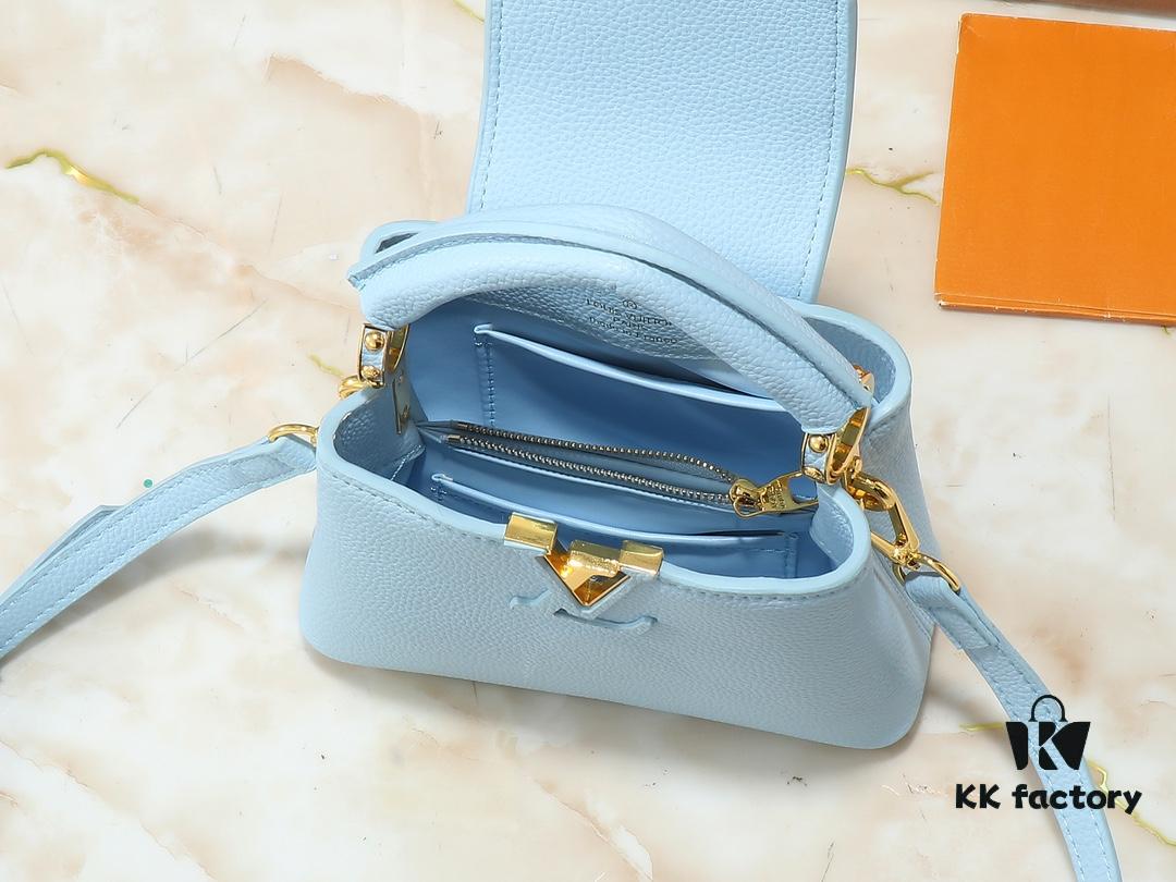 Upgraded Original M24728 M24736 M25087 M24655 M24656 M24733 M24729 M25090 M12785 M24727 M24745 This Capucines Mini Bag is crafted from refined Taurillon calf leather, accented with a lustrous handle ring and the iconic LV letter motif that enhances its compact silhouette. Featuring a detachable shoulder strap for versatile styling as a shoulder or crossbody bag. Dimensions: 21.0 x 13.6 x 8.0 cm (L x H x W)