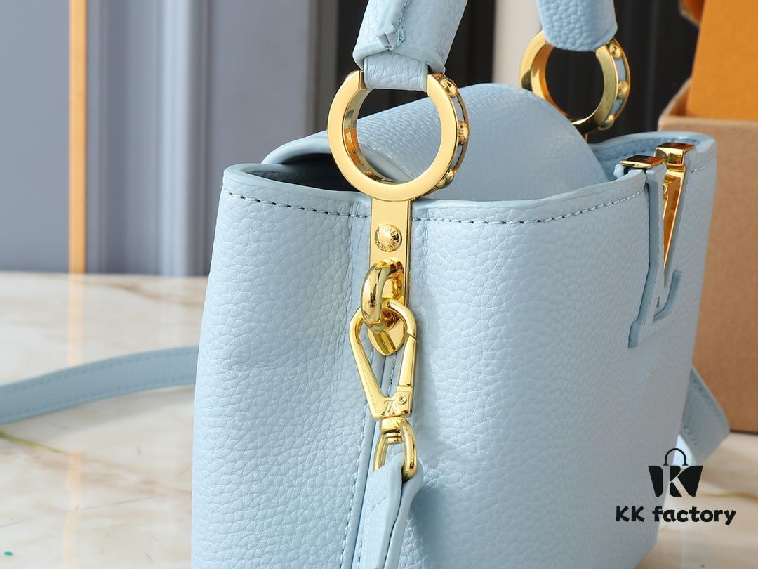 Upgraded Original M24728 M24736 M25087 M24655 M24656 M24733 M24729 M25090 M12785 M24727 M24745 This Capucines Mini Bag is crafted from refined Taurillon calf leather, accented with a lustrous handle ring and the iconic LV letter motif that enhances its compact silhouette. Featuring a detachable shoulder strap for versatile styling as a shoulder or crossbody bag. Dimensions: 21.0 x 13.6 x 8.0 cm (L x H x W)