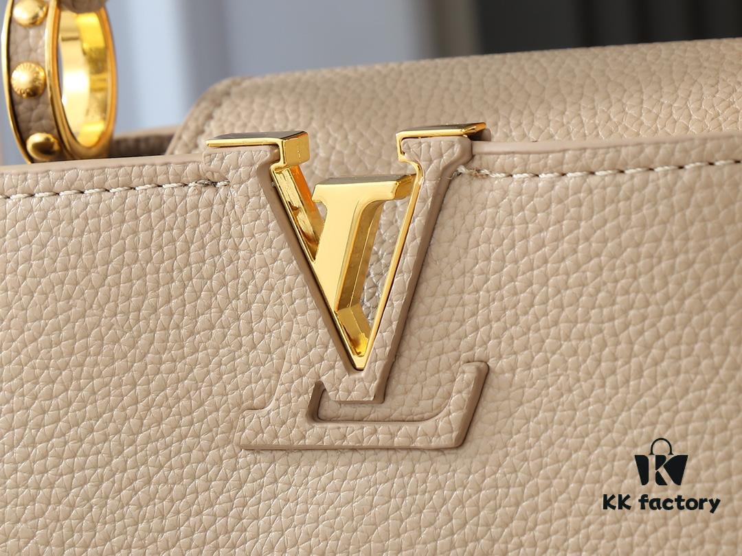 Upgraded Original M24728 M24736 M25087 M24655 M24656 M24733 M24729 M25090 M12785 M24727 M24745 This Capucines Mini Bag is crafted from refined Taurillon calf leather, accentuated by lustrous handle rings and the iconic LV letter signature, enhancing its compact silhouette. The detachable shoulder strap allows versatile styling as a shoulder or crossbody bag. Dimensions: 21.0 x 13.6 x 8.0 cm (L x H x W)