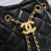 Chanel Vintage Drawstring Button Bag Made of Lambskin with Classic Quilting and Chain-in-Leather Strap
