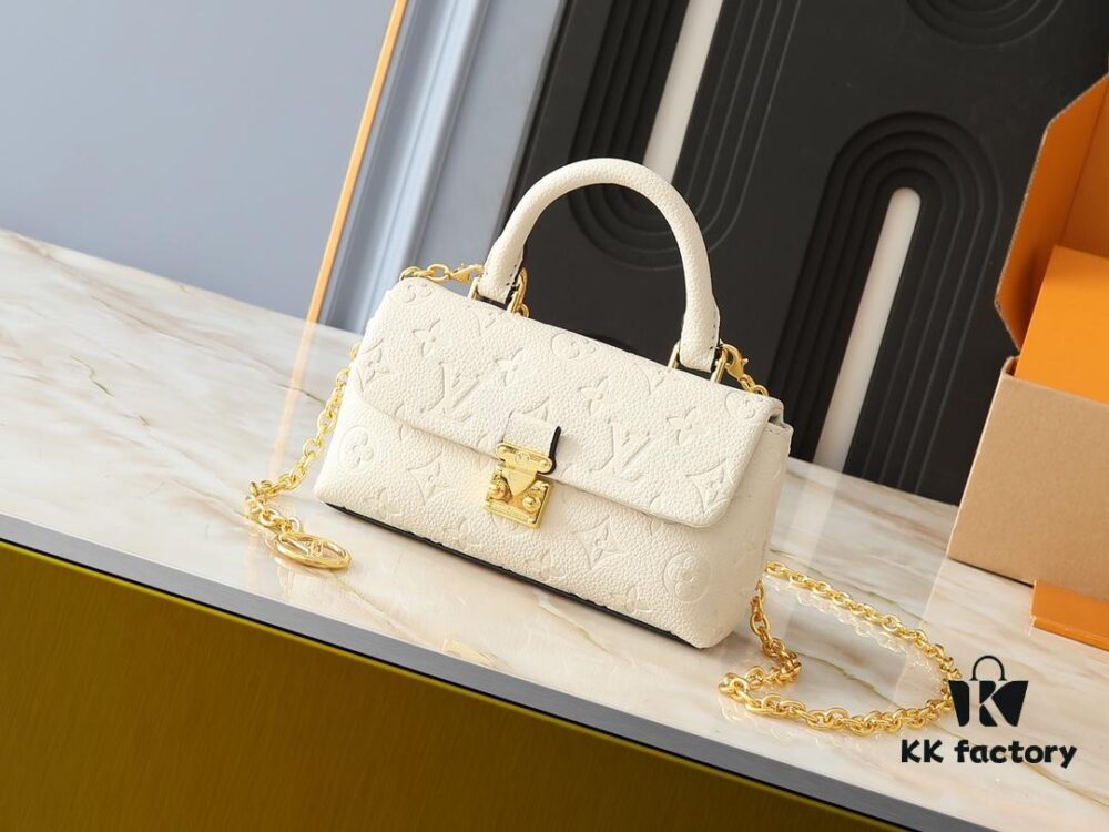 Upgraded Original M12145 White M12144 Black M12211 Blue This Nano Madeleine Bag Features a Miniature Version of the Madeleine Bag Crafted in Monogram Empreinte Leather with a Classic S-Lock Clasp and a Detachable Chain Accented with the LV Circle Logo Ideal for Carrying Daily Essentials Offering Versatile Carrying Options as a Handbag Shoulder Bag or Crossbody Bag Size: 12.5 x 6 x 21 cm (Height Width Length)