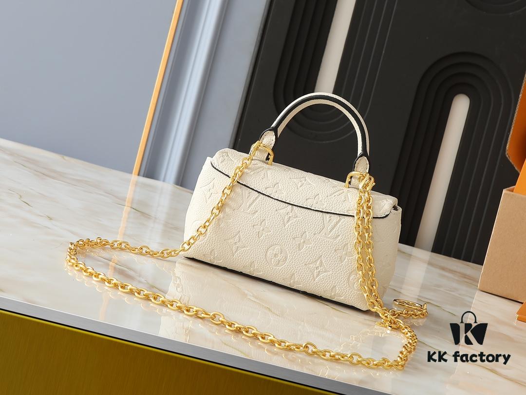 Upgraded Original M12145 White M12144 Black M12211 Blue This Nano Madeleine Bag Features a Miniature Version of the Madeleine Bag Crafted in Monogram Empreinte Leather with a Classic S-Lock Clasp and a Detachable Chain Accented with the LV Circle Logo Ideal for Carrying Daily Essentials Offering Versatile Carrying Options as a Handbag Shoulder Bag or Crossbody Bag Size: 12.5 x 6 x 21 cm (Height Width Length)