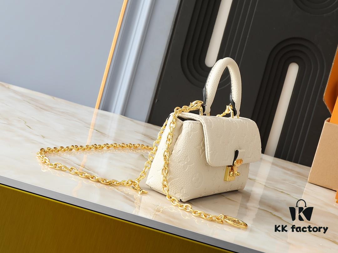 Upgraded Original M12145 White M12144 Black M12211 Blue This Nano Madeleine Bag Features a Miniature Version of the Madeleine Bag Crafted in Monogram Empreinte Leather with a Classic S-Lock Clasp and a Detachable Chain Accented with the LV Circle Logo Ideal for Carrying Daily Essentials Offering Versatile Carrying Options as a Handbag Shoulder Bag or Crossbody Bag Size: 12.5 x 6 x 21 cm (Height Width Length)