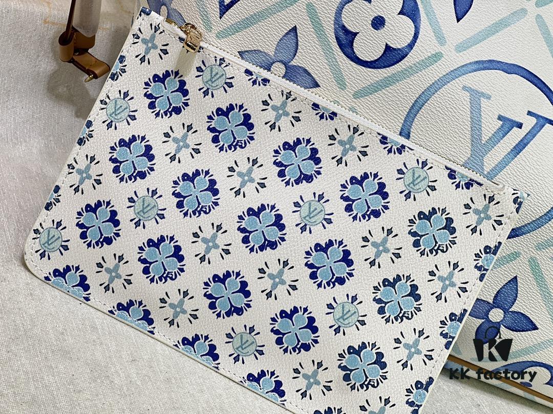 M24317 M40995 This Medium Neverfull Tote Bag Features a Monogram Tiles Canvas Construction with Leather-Trimmed Top and Handles