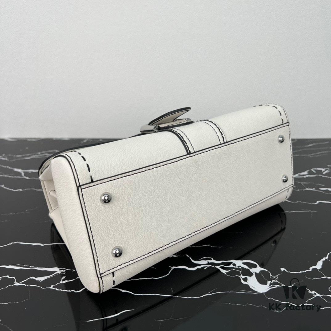 Delvaux 2024 Spring-Summer Exposed Stitching Collection Brillant PM Bag in Caramel