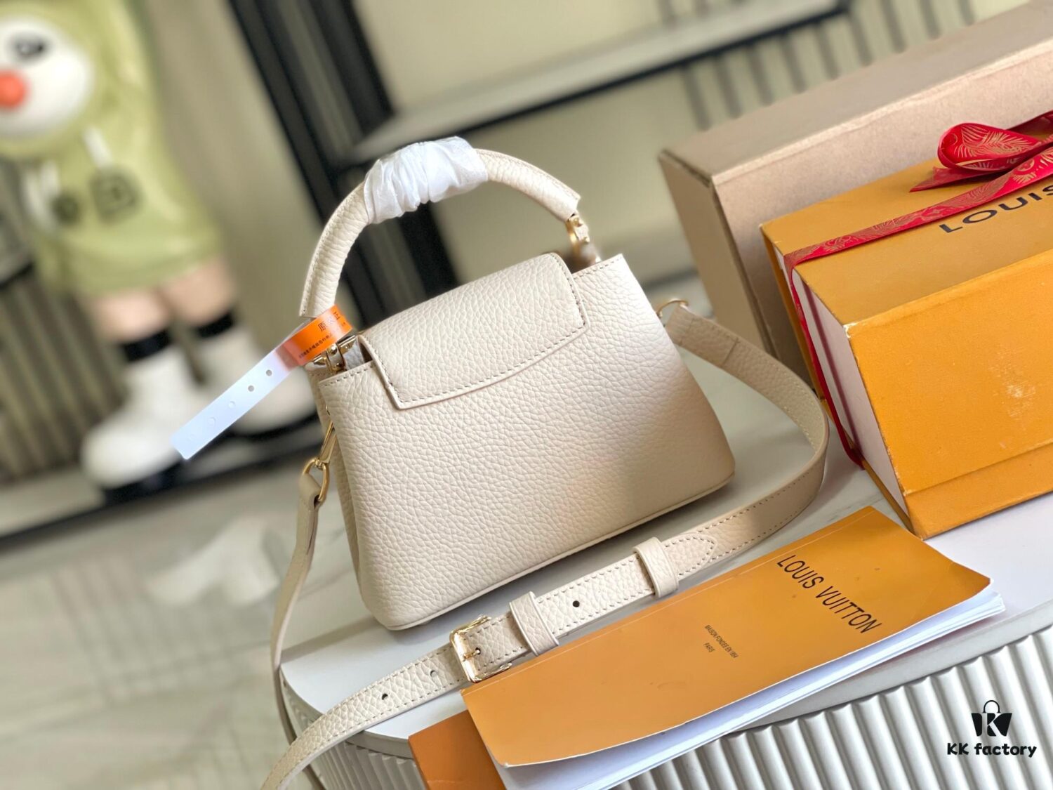 Capucines Mini Handbag with Detachable Strap, Full-Grain Taurillon Leather with Monogram Flowers and Mother-of-Pearl Details